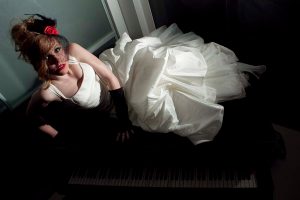 Picture of a bride laying on the floor by Sean Casey Photography
